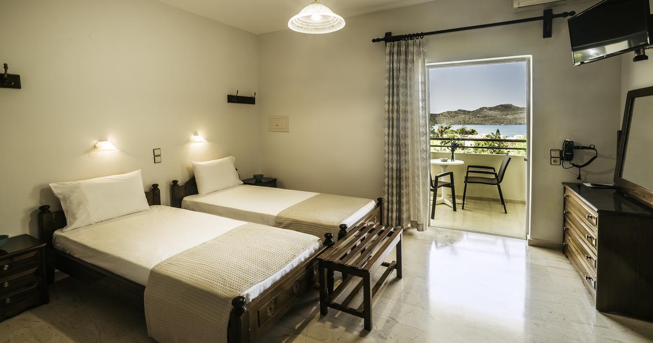 Merabello Apartments Agia Marina Buitenkant foto